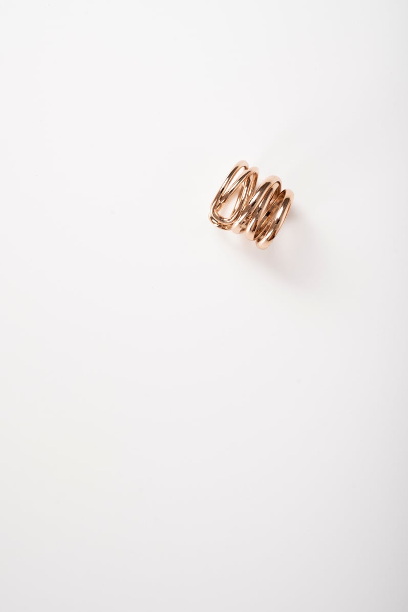 Photo of a ring top view on white background
